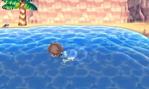 El jugador nadando en la playa