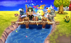 Al parecer, Iwata mandó construir un puente de madera y aquí celebran su inauguración. Una bonita celebración, la verdad, con esos pequeños cañones de confeti. Se confirma la reaparición de Astrid y Cuzco y además podemos ver a un nuevo vecino pingüino.