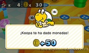 El amiibo de Koopa Troopa escaneado dandole monedas a Mario.