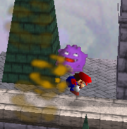 Koffing atacando a Mario.