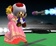 Peach usando a Toad como escudo ante un proyectil en Super Smash Bros. Melee.