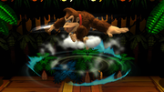 Donkey Kong usando Trompo Kong/Peonza Kong en el aire en Super Smash Bros. for Wii U.