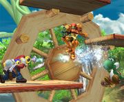 Mario utilizando el F.L.U.D.D./ACUAC contra Samus y Yoshi en Super Smash Bros. Brawl.