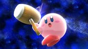 Kirby utilizando su Martillo en la Galaxia Mario.