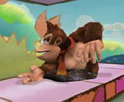 Donkey Kong enterrado por una Trampa en Super Smash Bros. Brawl.