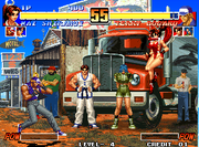 Terry Bogard luchando contra Mai Shiranui en The King of Fighters '96. Sus compañeros, Kim Kaphwan y Leona, pueden ser vistos al fondo.