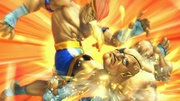 Adon derrotando a Sagat con su Ultra Combo I, Jaguar Revolver, en Super Street Fighter IV. Nótese los efectos alrededor de los personajes.