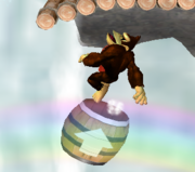 Donkey Kong siendo lanzado por el barril cañón del escenario Selva Kongo.