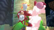 Knuckles atacando a Kirby en El gran ataque de las cavernas.