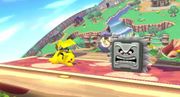 Kirby, hecho roca, toma la forma de la Roca Picuda, un enemigo de la serie Mario.