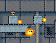 Un Hothead y dos Sparkies en Super Mario World.