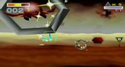 Un Arwing pasando por un anillo plateado en Star Fox 64. Puede verse un segundo anillo más adelante.