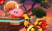 Kirby usando el martillo en tierra en Super Smash Bros. for Nintendo 3DS.