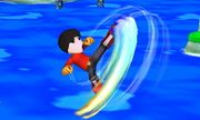 Peleador Mii/Karateka Mii usando Patadas giratorias en Super Smash Bros. for Nintendo 3DS.