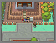 Otra captura, donde se resalta el Pokémon inicial siguiendo al protagonista. El edifico que se encuentra a su lado es la Torre Quemada, en Ciudad Iris.