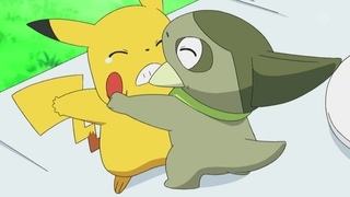 Archivo:EP668 Axew peleando con pikachu.jpg