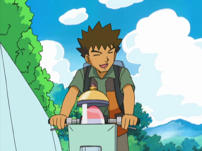 Archivo:EP507 Brock en bici junto a su huevo.png