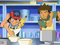 Archivo:EP553 Ash y Brock cocinando.png
