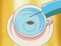 Archivo:EP531 Añadiendo simplemente café en el agua.png