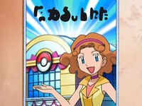 Marian en el anuncio del Concurso Pokémon de Majolica.