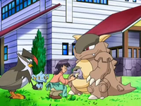Archivo:EP569 Reggie atendiendo a los Pokémon.png
