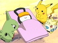 Larvitar, Pikachu y Togepi cuidando a Unown.