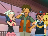 Ash, Dawn/Maya y Brock bebiendo leche Mu-mu en el Café Doncellas.