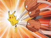 Dodrio usando ataque furia contra el Pikachu de Ash.