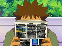Archivo:EP567 Brock leyendo el periódico.png