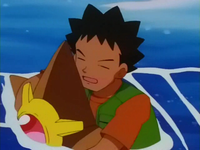 Staryu nadando con Brock.