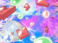 Partes rojas y esferas/gemas en la imaginación del Equipo/Team Rocket.
