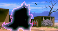 Un Tyranitar saliendo de una Negra Ball.