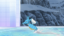 Kingdra de Levi activando nado rápido bajo la lluvia para volverse más rápido.