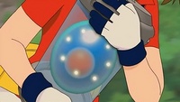 May/Aura llevando el huevo de Manaphy en la película Pokémon Ranger y el Templo del Mar.