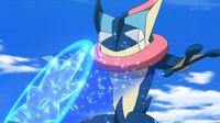 Greninja de Ash usando shuriken de agua.
