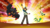 Ash junto a sus Pokémon celebrando su victoria.