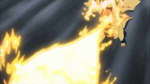 Druddigon de Iris usando dragoaliento.