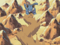 Nidoqueen usando golpe roca.