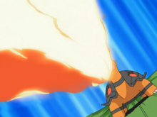 Torkoal de Ash usando lanzallamas.