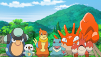 Kingler y su comunidad de Pokémon tipo agua del Laboratorio del profesor Oak.