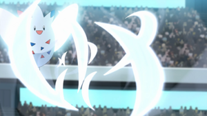 Togekiss de Cynthia/Cintia usando tajo aéreo.