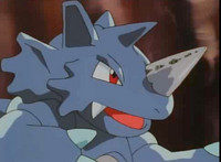 Rhydon de Blaine usando cuerno taladro/perforador.