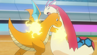 Dragonite de Iris usando puño trueno.