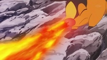 Tepig de Ash usando lanzallamas.