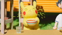 Pikachu comiendo comida picante.