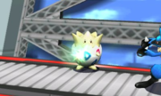 Togepi usando metrónomo en SSB4.