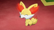 EP808 Fennekin expulsando cenizas de sus orejas.png