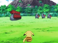 Pikachu mirando a los Probopass y Nosepass.