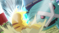 Metagross de Alain usando garra de metal/garra metal.