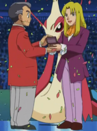 Robert/Roberto obteniendo el listón/cinta.